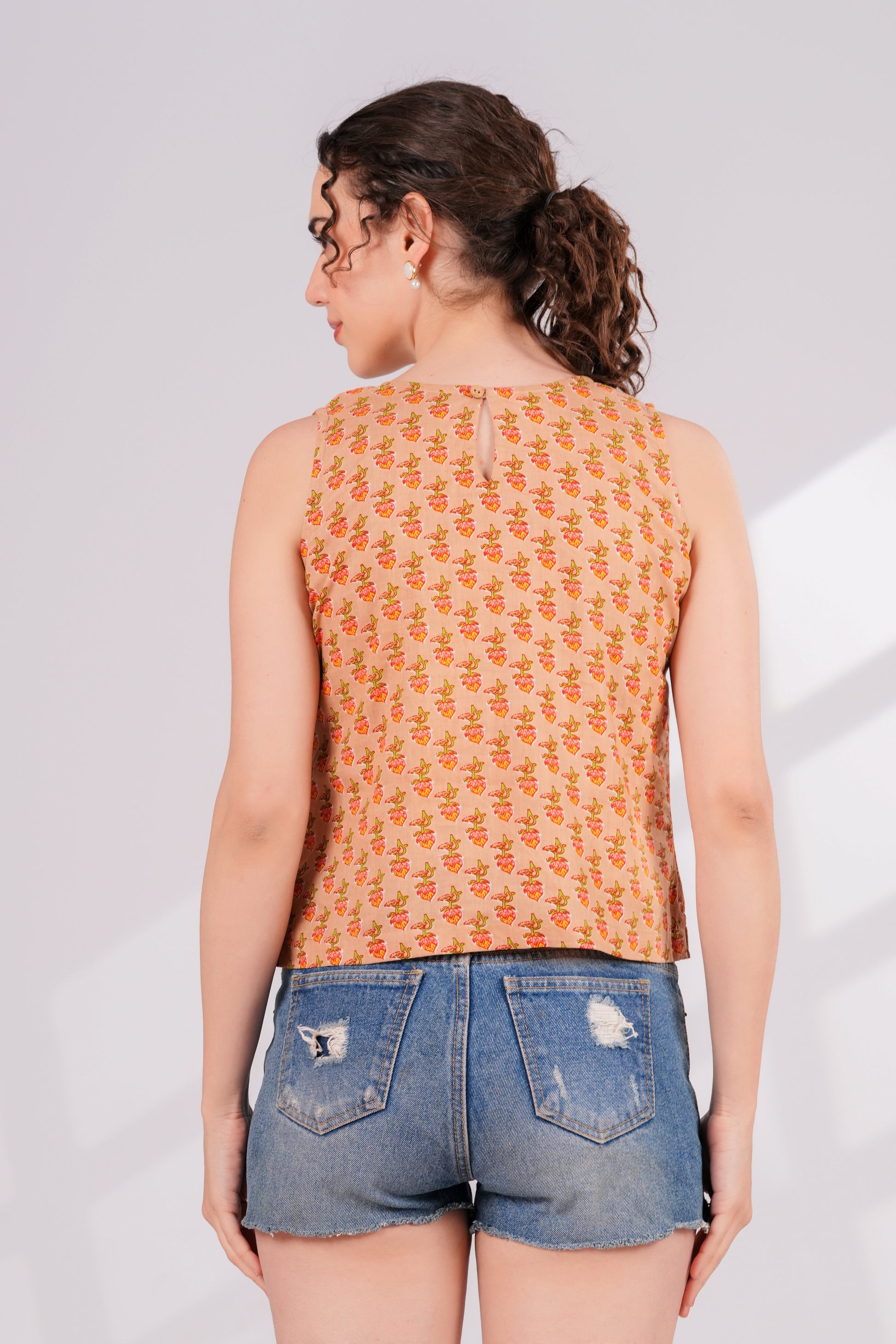 Orange Printed Back key Hole Top | JOVI India