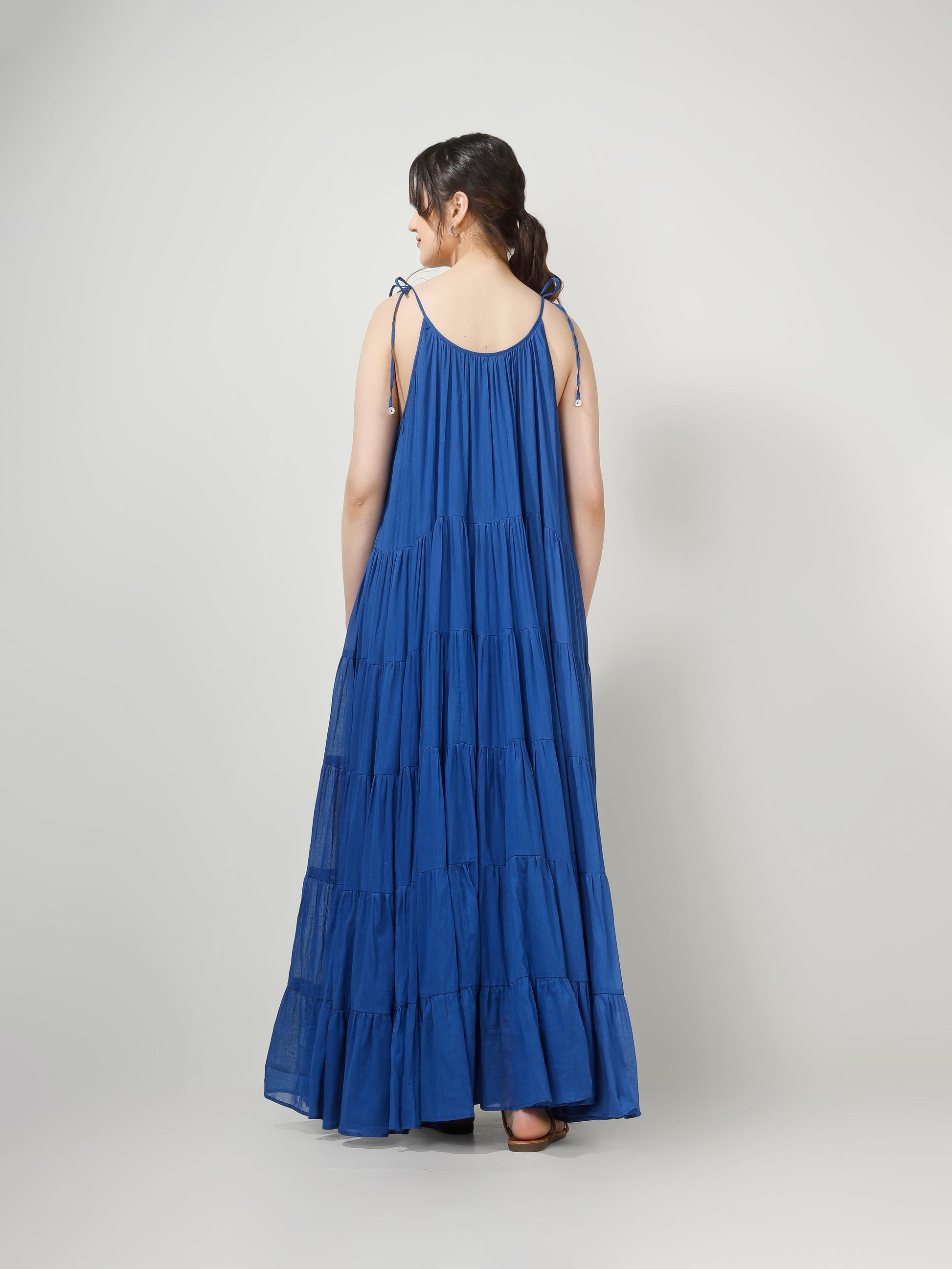 Blue tiered maxi dress with tie-up straps for women from JOVI India